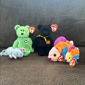 Ty Plush Collection with Green, Black, Gray, and Colorful Designs